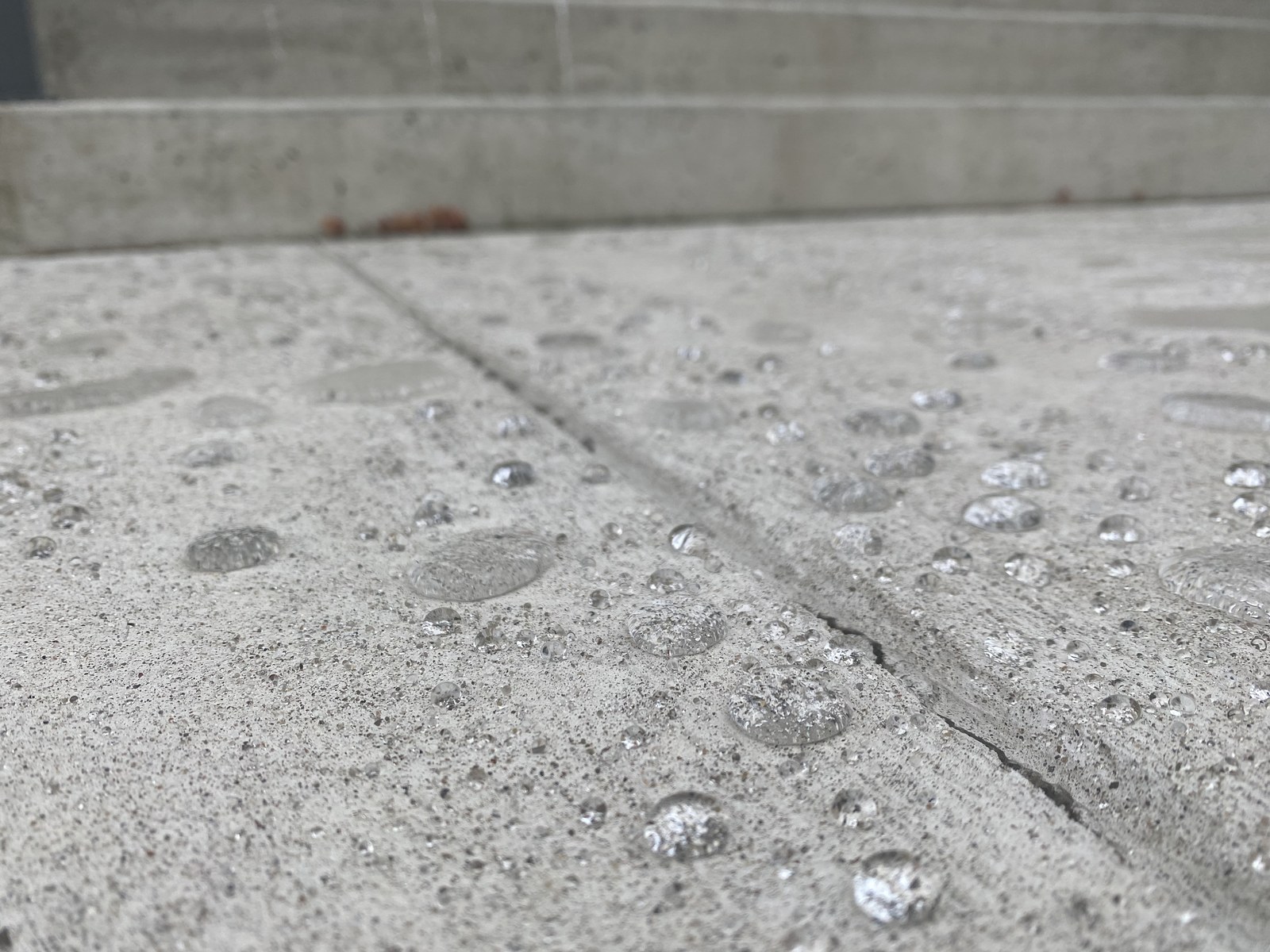 Water beading tightly on GoNano-treated concrete in Northern Utah